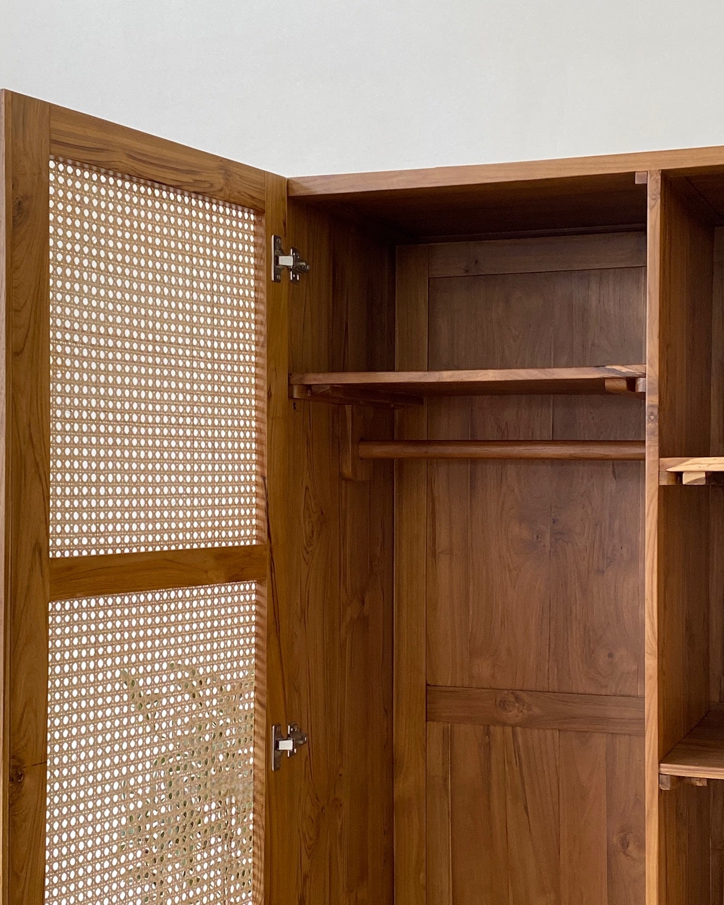 Handcrafted Wooden Closet with Natural Cane Doors