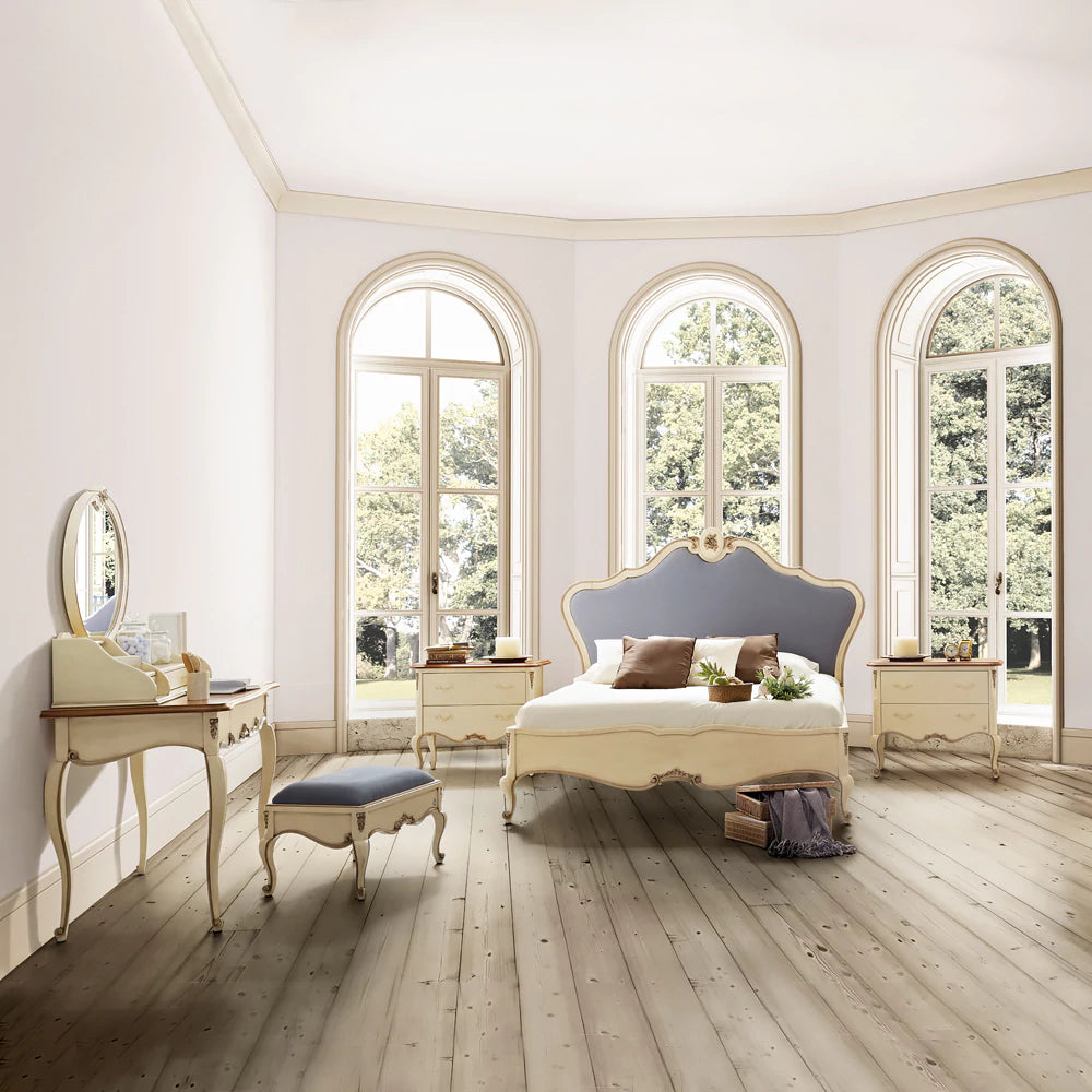 Elegant Wooden Bed with Hand-Carved Detailing and Tufted Headboard