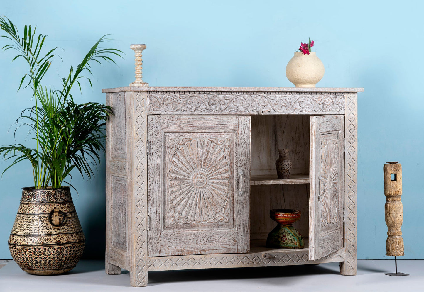 Luxury Carved Storage Cabinet with Intricate Wooden Detailing